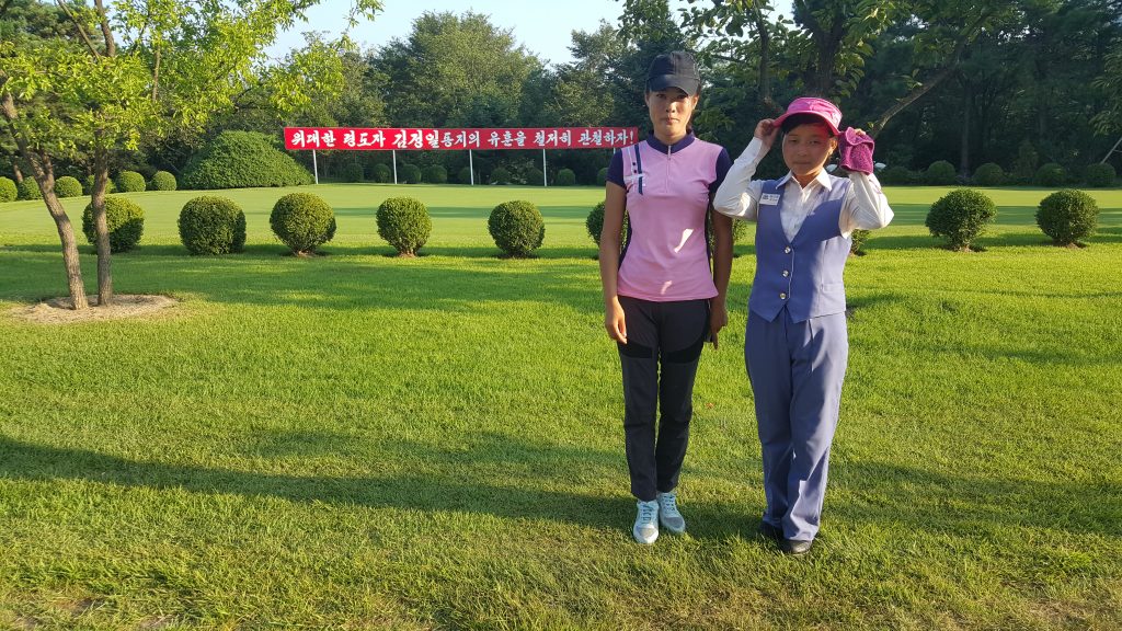 golf in North Korea. Female caddies, North Korea