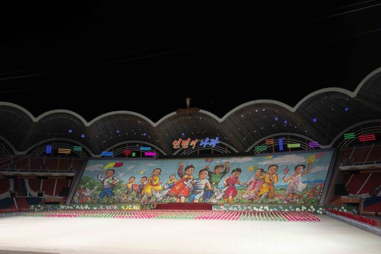 Thousands of schoolchildren perform a mass display in Pyongyang, North Korea.