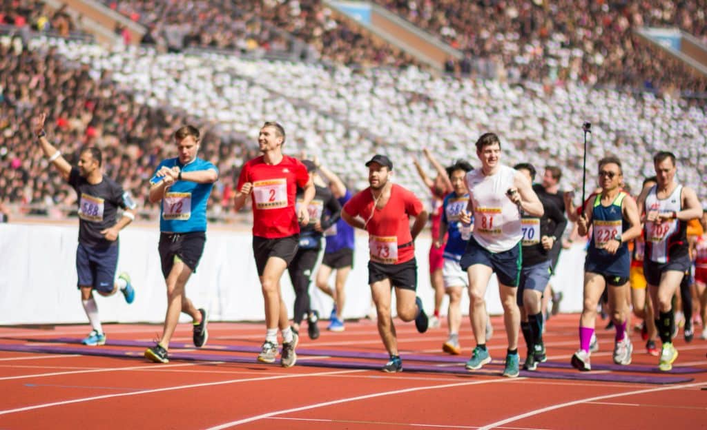 Foreign racers take to the track at Mayday stadium for the Pyongyang marathon at the rungrado may day stadium