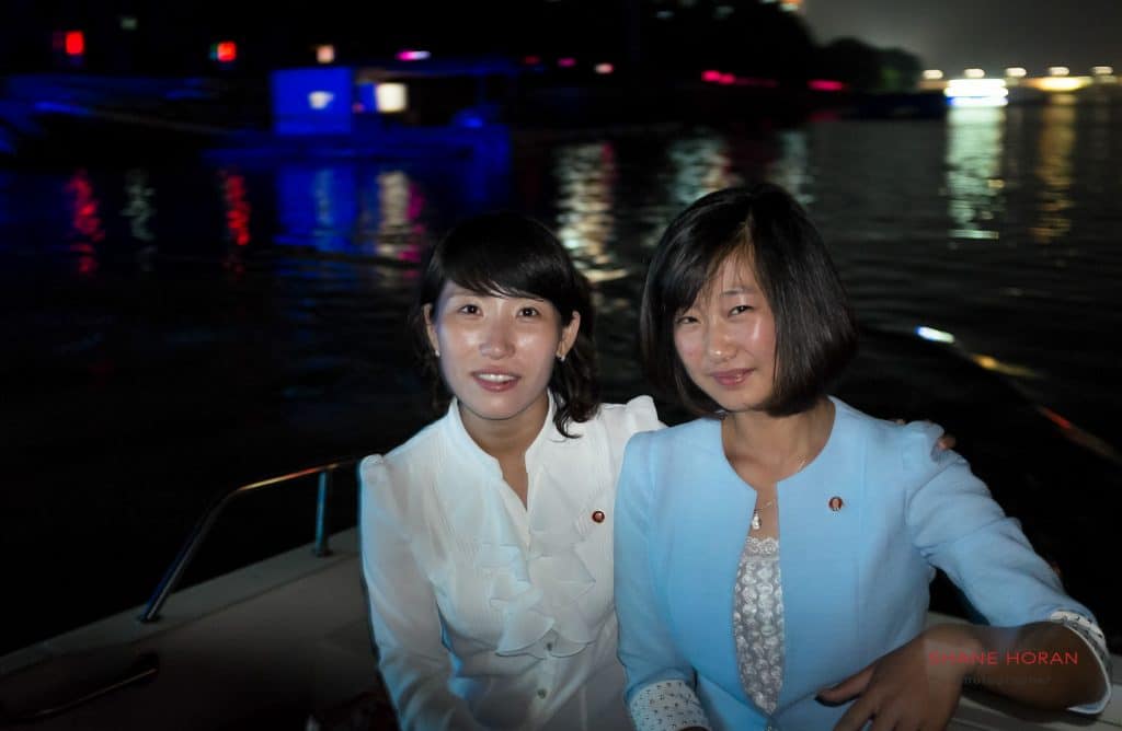Two female north korean guides on tour in North Korea