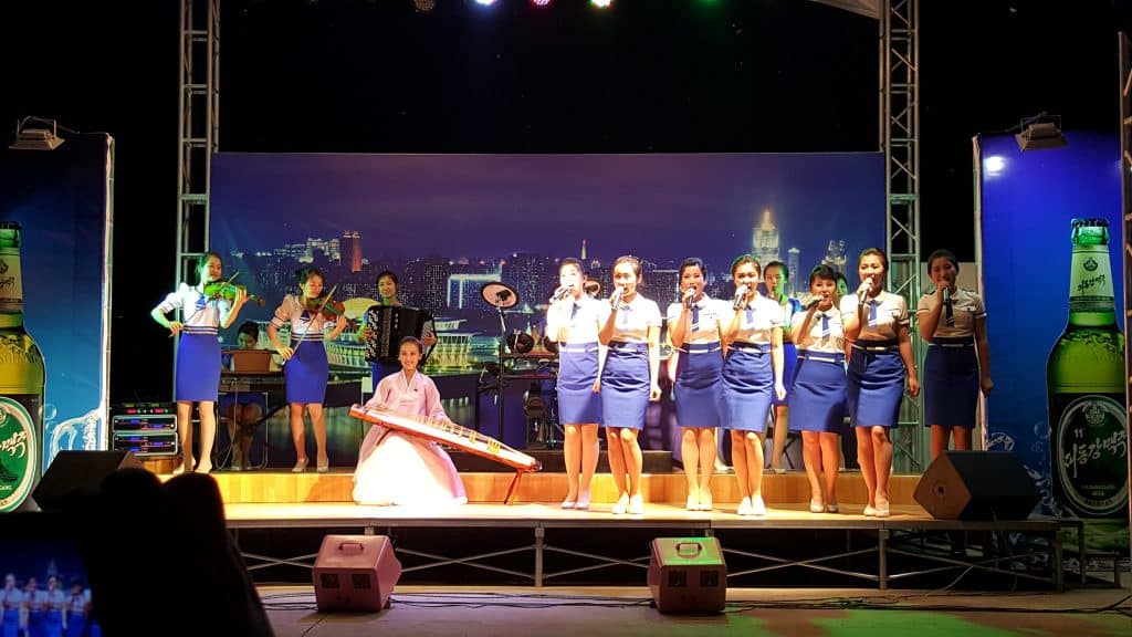 Waitresses singing at a North Korea beer festival