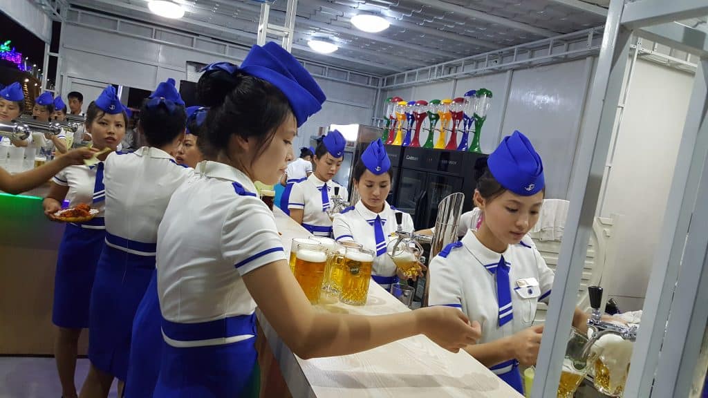 staff at a beer festival in Pyongyang, North Korea