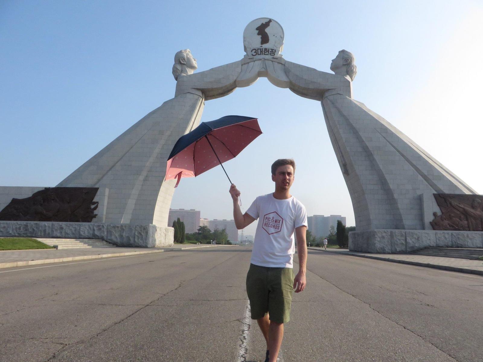 Tourist at the reunification monument, Pyongyang