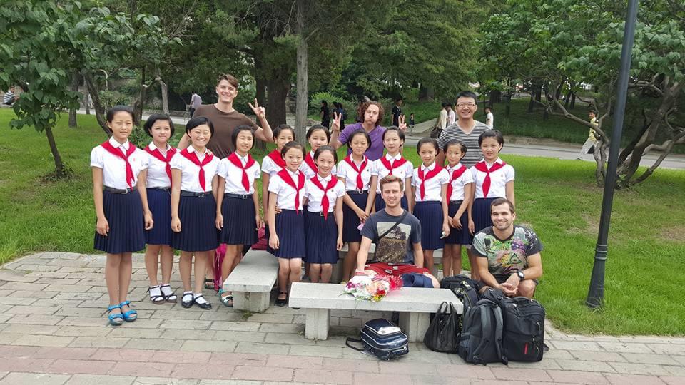 North Korean schoolkids with tourists on a North Korea tour