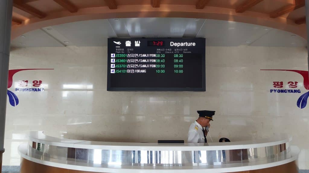 Domestic flight to Samjiyon on the departure board, Pyongyang