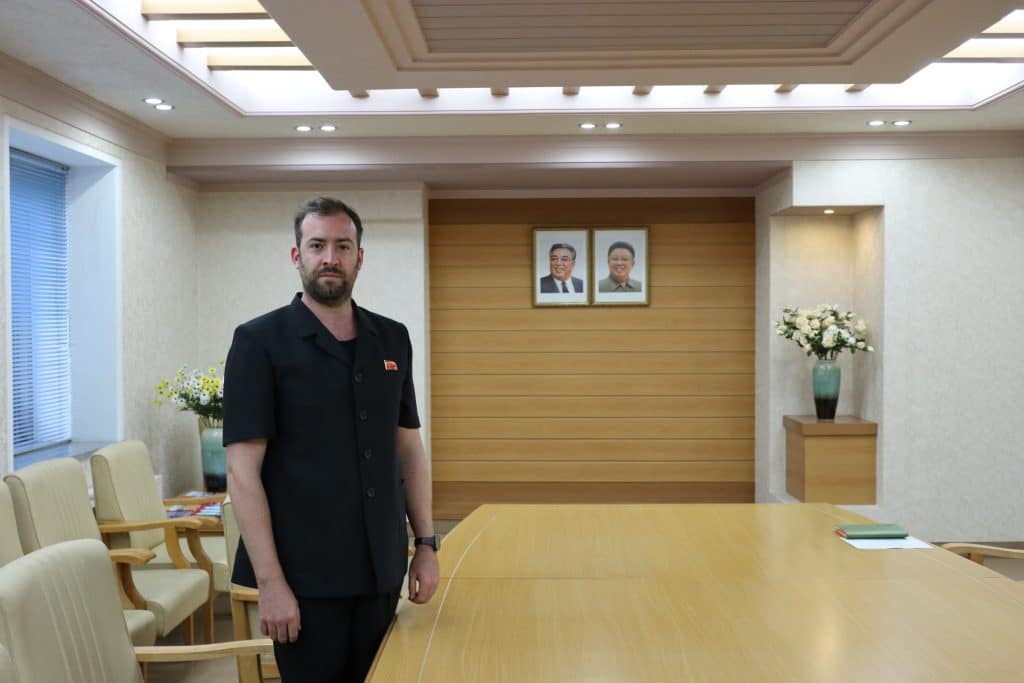 Tourist wearing a North Korean suit in Pyongyang
