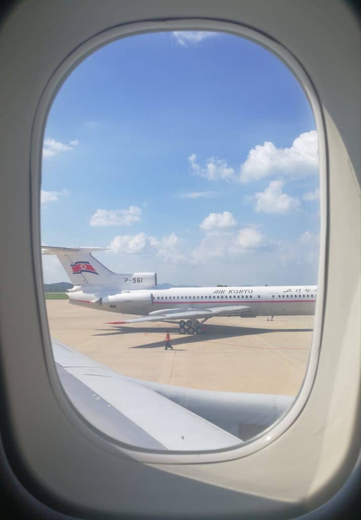 Arriving in Pyongyang airport looking at air Koryo outside the window