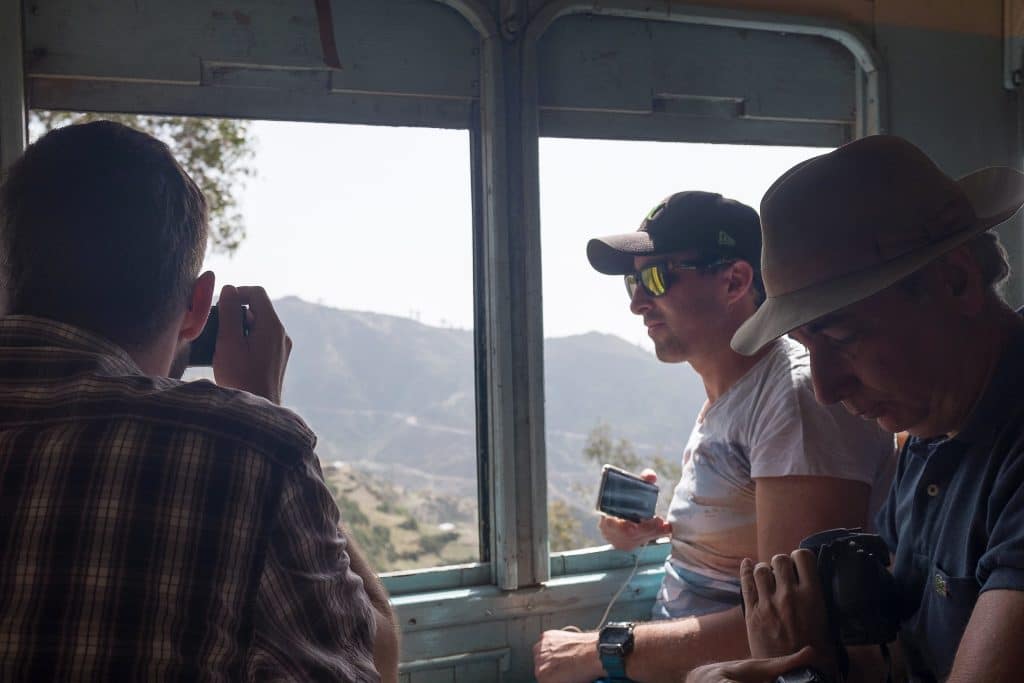 tourists riding a steam train in Eritrea