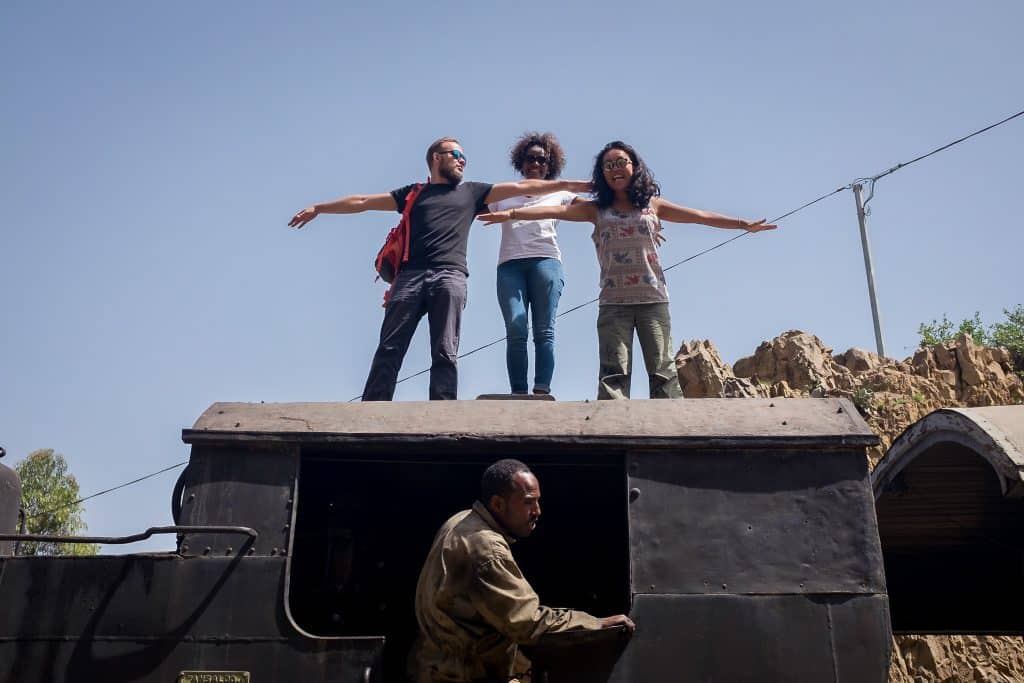 Tourists on top of the Eritrean steam train